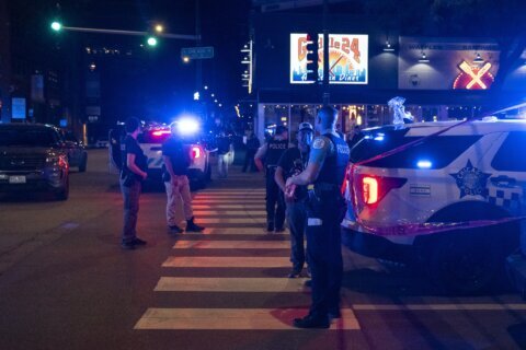 Drive-by shooting kills 4 and wounds 14 others after a party at a Chicago restaurant