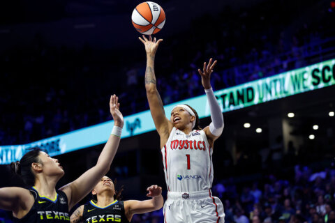 Rookie JJ Quinerly scores season-high 15 in her first WNBA start to help the Wings beat the Mystics