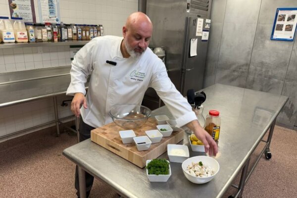 Chef Jeremy Sharpe prepared ingredients in a kitchen