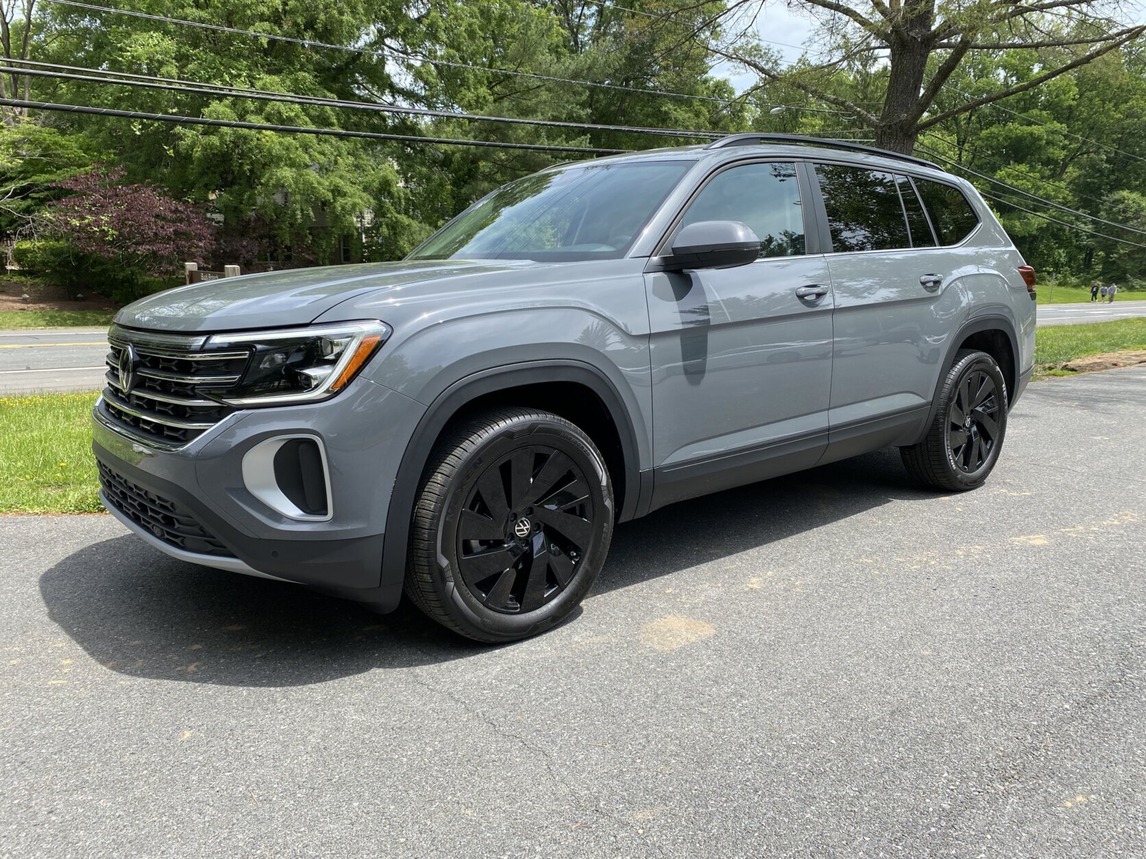 Both vehicles both follow a popular modern aesthetic: cement gray paint with black wheels.