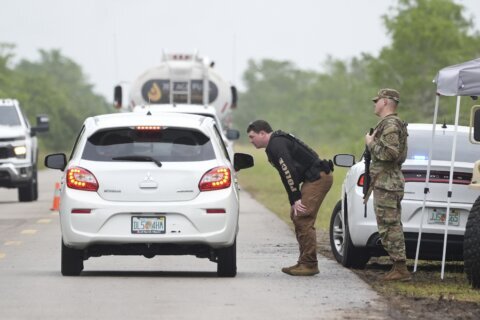 First immigration detainees arrive at Florida center in the Everglades
