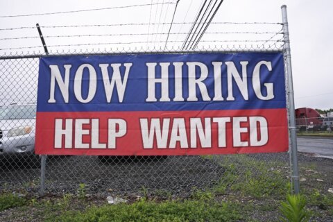 U.S. applications for jobless aid fell to 233,000 last week as layoffs remain low